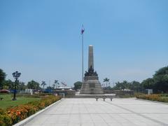 Rizal Park landmarks and attractions, including Wisdom Walk, Confucius Monument, La Madre Filipina, Pepe & Friends, Rizal National Monument, and Calesas