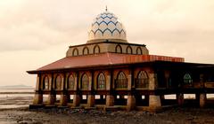 Masjid Al Hussain floating mosque in Kangar, Malaysia at sunset