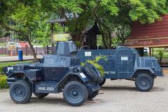 Armoured trucks next to Proclamation of Independence Memorial in Malacca City, Malaysia