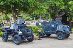 Armoured trucks next to the Proclamation of Independence Memorial in Malacca City, Malaysia.