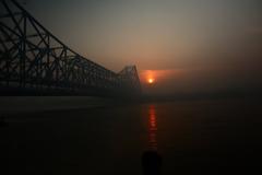 Howrah Bridge at sunrise with Hooghly River