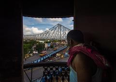 Howrah Bridge view from window overlooking Hooghly River in West Bengal