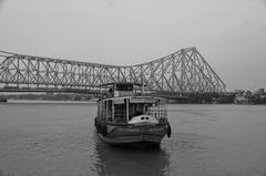 Ferry on Ganga River with Howrah Bridge in the background