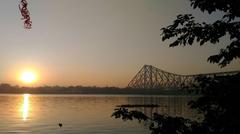 Side view of Howrah Bridge over Hooghly River