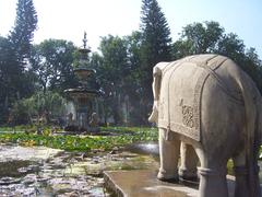 Scenic view of Udaipur Gardens with lush greenery and architectural elements