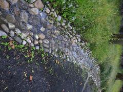 hand laid rock streams and paths with trickling water sounds