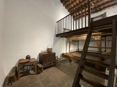 Interior of Sam Tung Uk period house showing old furniture