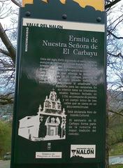 Informational plaque at Santuario de la Virgen del Carballo