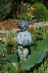 Putti statue at Duke Gardens