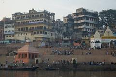 Scindia Ghat in Varanasi with boats along the riverbank