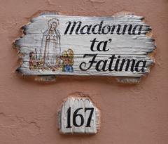 Roman Catholic imagery on a house in Tarxien, Malta