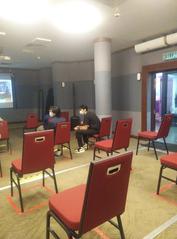 Sky Deck at Kuala Lumpur Tower with people attending a briefing