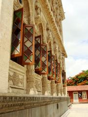 Shinde Chatri Mahadev Mandir exterior with sculpted windows in Pune