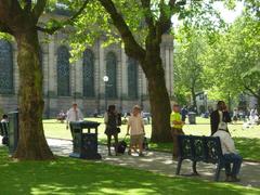 St Philip's Cathedral with people enjoying green space