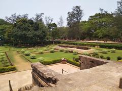 back view of Konark Sun Temple with surrounding garden