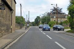 A44 Manor Road with buildings and greenery