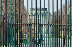 fence separating the Schönbrunn Palace Park and Zoo with the Kaiser Pavilion in the background