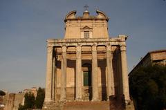 Roman ruins of the Temple of Saturn with columns and ancient structures in Rome