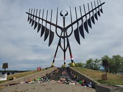 Spirit Catcher adorned with children's footwear in June 2021