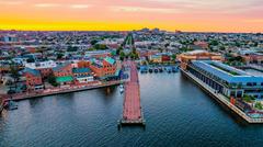 Aerial view of Fell's Point waterfront in Baltimore at sunset, June 2022