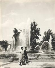 two African American women walking past Swann Memorial Fountain at Logan Square in Philadelphia