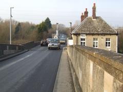 Swinford Bridge over the River Thames with toll house on the right