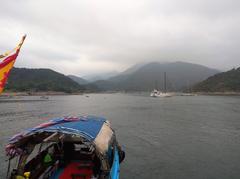 Scenic view of Tai Tam Harbour with blue waters and green hills