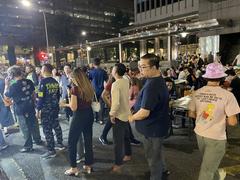 Lau Pa Sat market in Singapore with patrons dining