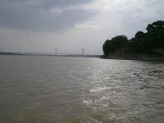 Yamuna river with Allahabad Fort and suspension bridge in the background