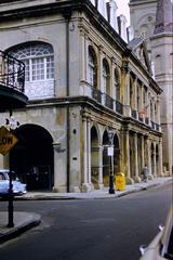 Cabildo building in New Orleans, 1955 with bilingual street signs