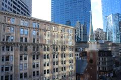 Old South Meeting House in Boston with surrounding modern buildings