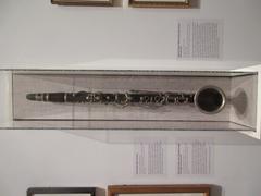 Albert system Penzel-Mueller alto clarinet with silver bell on display