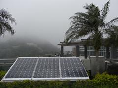 Peak Galleria roof with solar cell panel on a foggy Sunday morning in Hong Kong