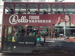 Wan Chai Johnston Road tram with food advertisements in April 2021