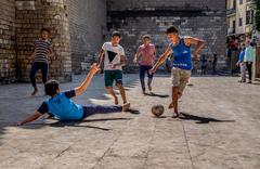 children playing street football in Egypt