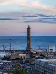 night view of the Genoa cityscape with landmarks and illuminated buildings