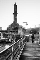 a scenic walkway leading to the iconic Genoa Lantern