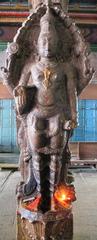 Vishnu statue holding chakra and sankha at Tirupparamkundram