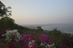 Scenic view of Thotlakonda Beach with rocky terrain and ocean waves