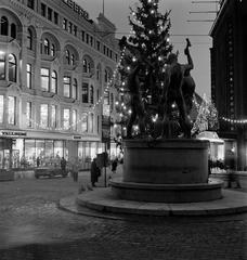 Aleksanterinkatu Christmas Street with Christmas tree in Kolmensepänaukio