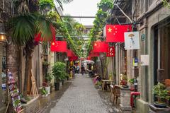 Tianzifang street with shops and visitors in Shanghai