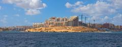 Malta coastal view with blue sea and rocky shoreline