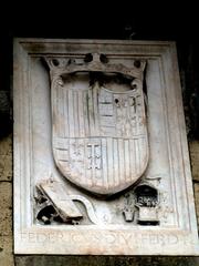 Relief sculpture on an arch adjacent to the Castel Nuovo in Naples featuring the royal coat of arms of King Frederick of Naples