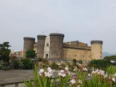 Castel Nuovo in Naples, Italy, viewed from the gardens of Palazzo Reale