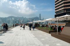 Avenue of Stars at night in Hong Kong with skyline view