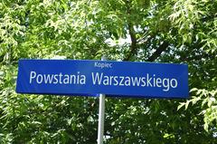 Kopiec Denkmal monument street sign in Warsaw Mokotow