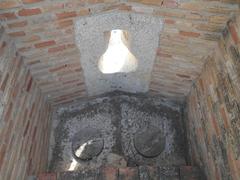 Murder holes in the battlements of the Tower of Paterna, Valencia, Spain