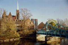 Most Tumski bridge in Wrocław over Oder River with Ostrow Tumski in the background