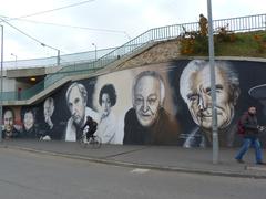 graffiti mural of Hungary's National Actors on Rákóczi Bridge in Budapest