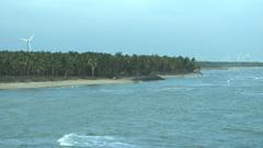 Scenic coastal view from Vattakottai Fort showing lush greenery and the ocean